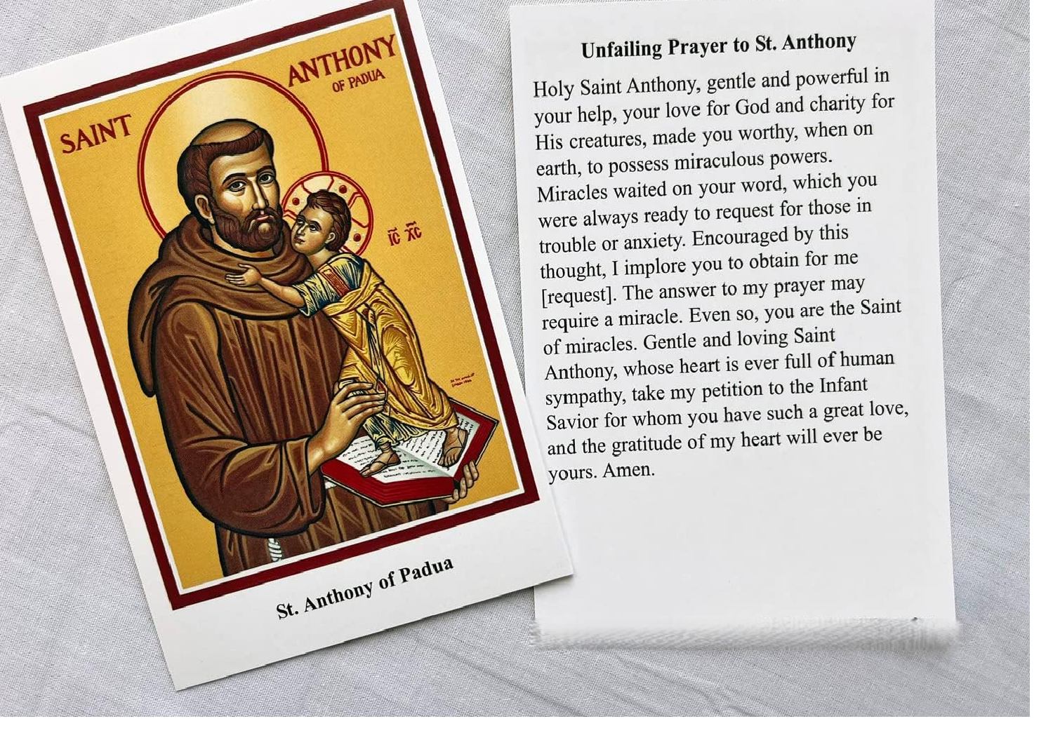 Spellmaker St. Anthony prayer card used as a Catholic counterpart representation of Papa Legba